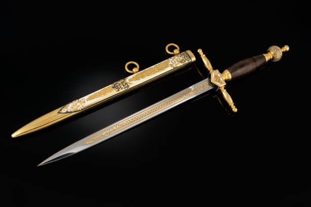 istock collectible silver dagger with scabbard on black 1369628567