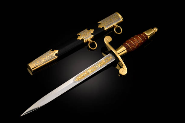 istock collectible silver dagger with scabbard on black 1369628612