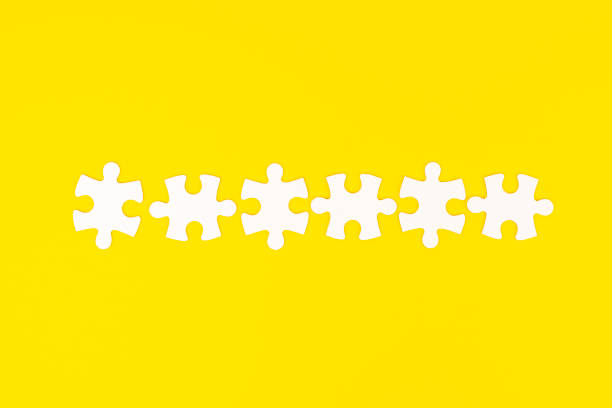 istock row of white puzzle pieces 1369632351