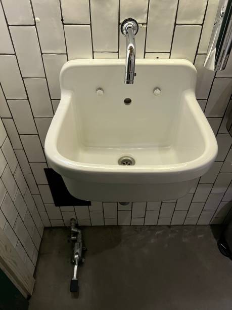 istock white retro washbasin with pedal 1369636878