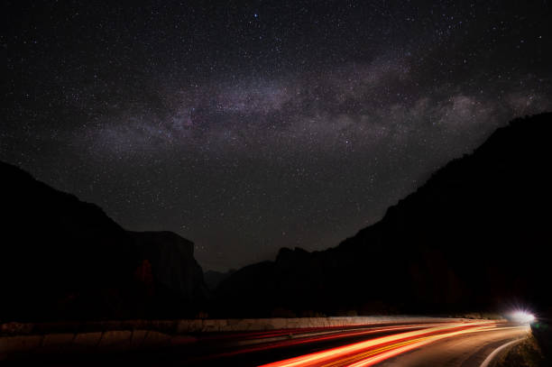 istock Milky Way and Car Lights 1369638341