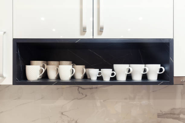 istock white coffee cups on a wooden shelf 1369639861