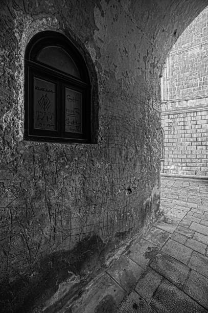 istock Old Textured Wall and Window under Archway in Mdina 1369642506