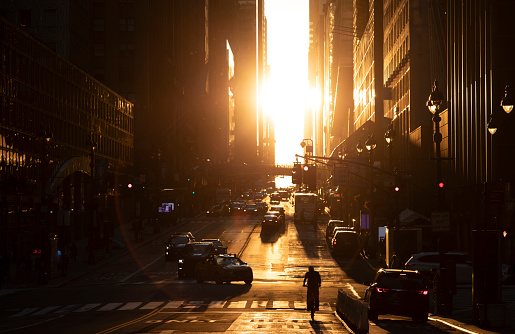 Sunset between the skyscrapers of midtown Manhattan in New York City.