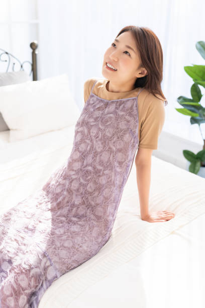 istock attractive asian woman relaxing 1369651318