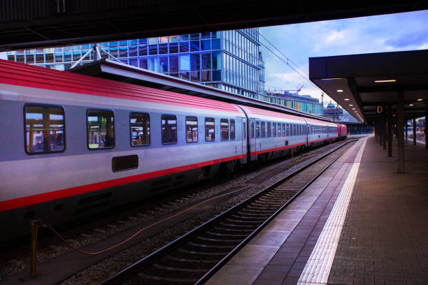 istock Platform and intercity train stand on the station 1369652508