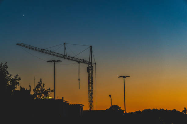 istock View of a construction site in the setting sun. 1369657129