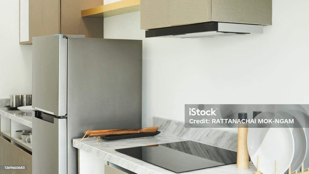 Modern kitchen interior with built-in appliances Glass-Ceramic Stove Top Stock Photo