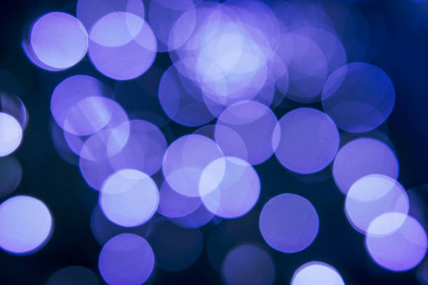 istock Bokeh circle lights at night in party. 1369660992
