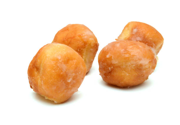 istock sugary donut isolated on a white background 1369663848