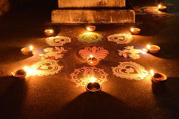 Diwali candles and rangoli stock photo