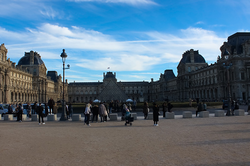 The inner court of Louvre Museum in Paris France on a sunny day