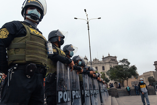 LIMA, PERU - AUGUST 22, 2021:The police close the plaza San Martin to repress the call for a demonstration against the government