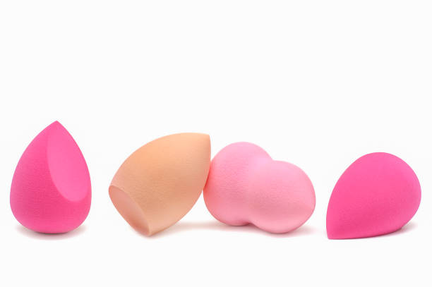 istock Sponges for make-up of different colors on a white background 1369687014