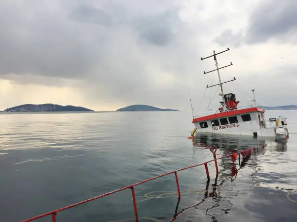 Sunken ship in the Istanbul Bosphorus . Shipwreck after the storm