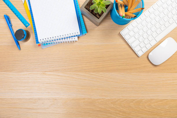 istock Office table with tablet,smartphone,pen,coffee cup, glasses and cactus, copy space,Top view, flat lay 1369695562