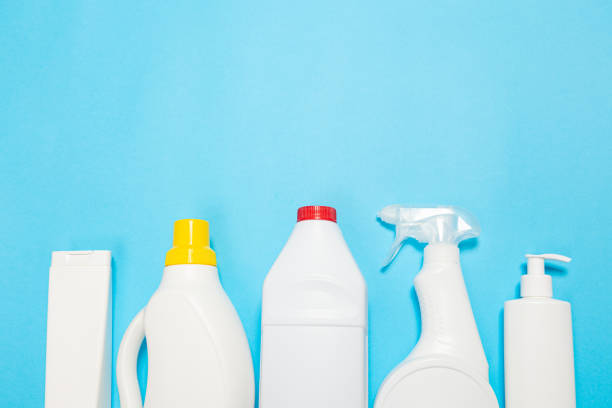 istock cleaning agent on a blue background on the side. Professional cleaning products, general cleaning. Household chemicals top view 1369695738