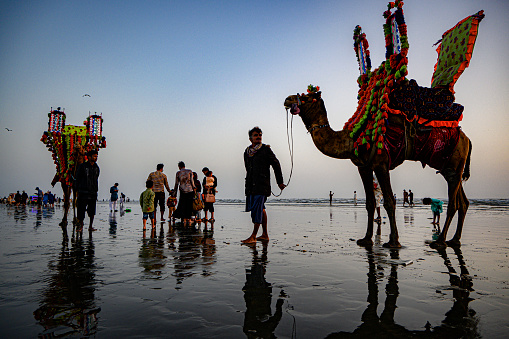 People with Camel at Seaview,Karachi,Sindh,Pakistan