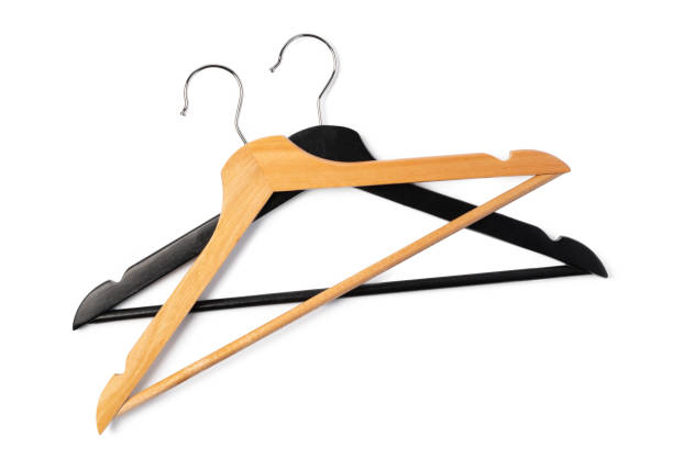 istock a pile clothes hangers on isolated white background 1369698263