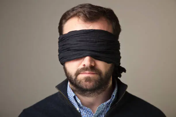 Blindfolded man portrait