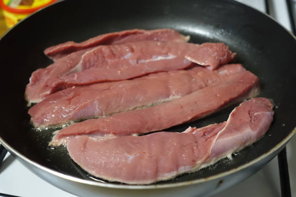istock Sliced duck breast being fried 1369698958