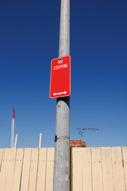 istock No stopping sign on a metal pole 1369700286