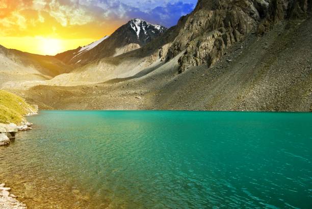 istock emerald mountain lake at the evening 1369700362