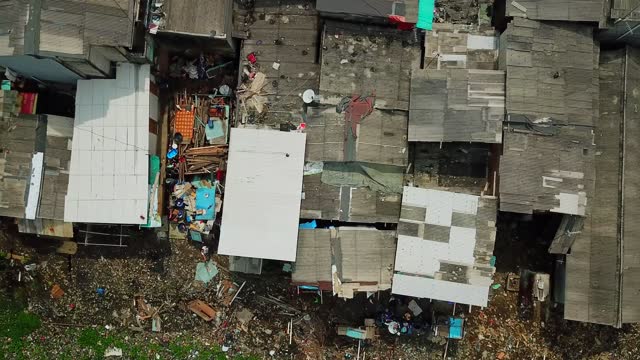 Aerial view of slum neighborhood on lakeside