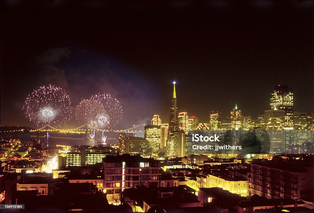 New Years Fireworks in San Francisco 2000 Fireworks display on New year's eve on the 1999/2000 new year.  Image taken from above the Broadway Tunnel from a roof top on Jones Street.  Image taken on chrome film and drum scanned. 2000 Stock Photo