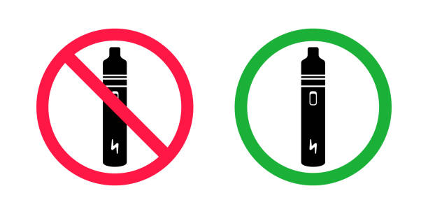 istock No vaping and vaping area signs. Red forbidden and green allowed circles signs 1369701936