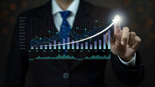 istock Businessman pointing arrow graph corporate future growth plan 1369703208