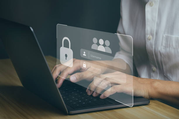 istock Businessmen protecting personal data on laptop and virtual interfaces 1369703293