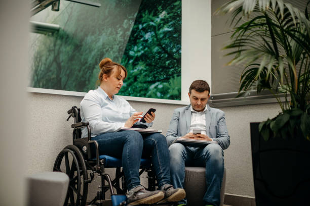istock Working in wheelchair 1369705688