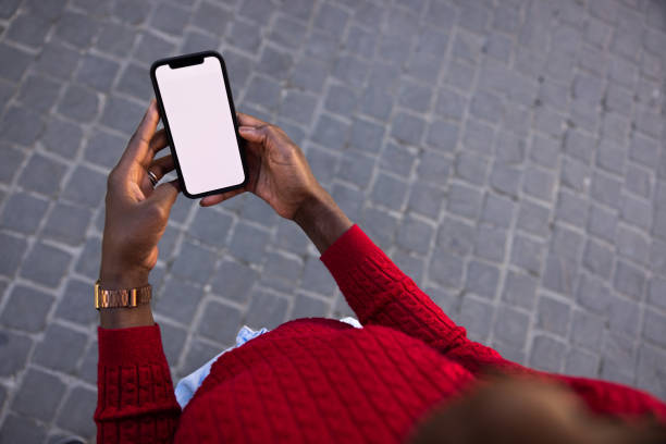 istock Woman on the go ordering meal with a mobile app 1369706160