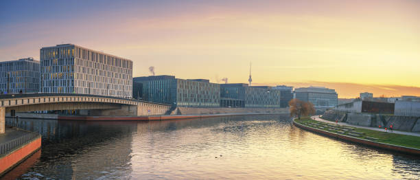 istock Modern Office Buildings along the Berlin River Spree 1369708188