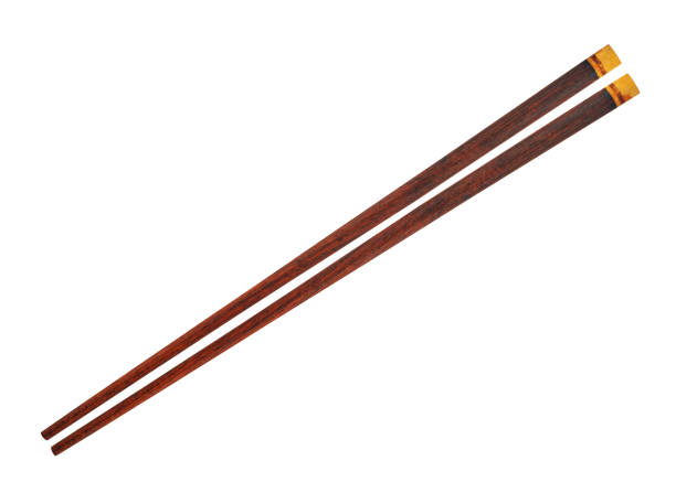 istock Wooden chopsticks isolated on white background. 1369709682