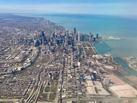 Chicago and Lake Michigan are seen in an aerial view on a sunny spring day.