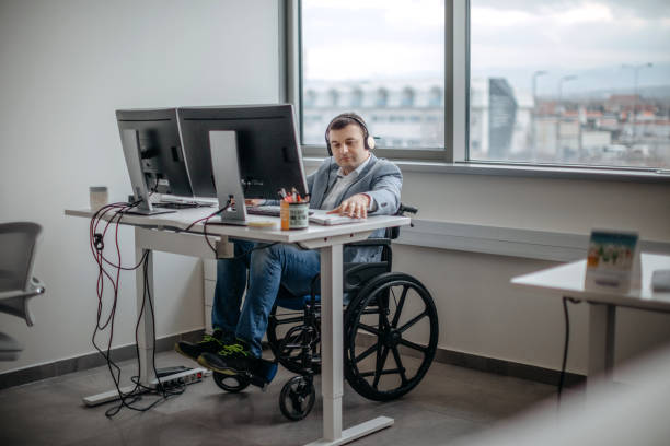 Working in wheelchair stock photo