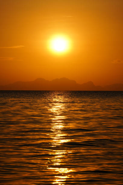 Seascape, sunset sky at the lake with empty on sky.