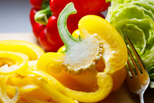 A collection of Japanese vegetables cut up for cooking and various recipes.
