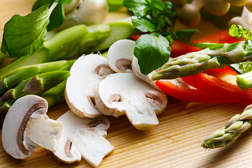 A collection of Japanese vegetables cut up for cooking and various recipes.