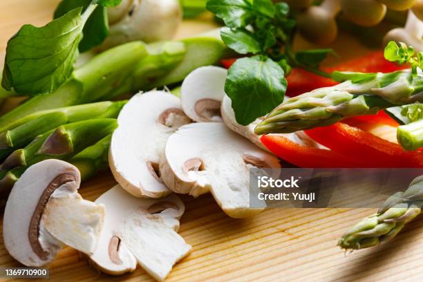 Cut Mushrooms And Asparagus Stock Photo - Download Image Now - Asparagus, Mushroom, Recipe