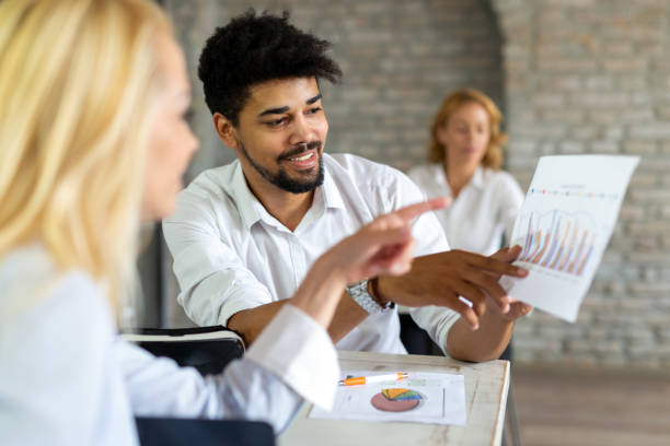 istock Startup diversity teamwork brainstorming meeting concept. Group of multiethnic people working 1369711236
