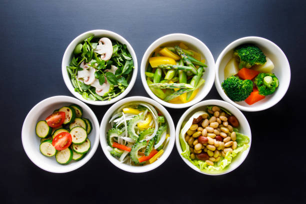 A collection of Japanese vegetables cut up for cooking and various recipes.
