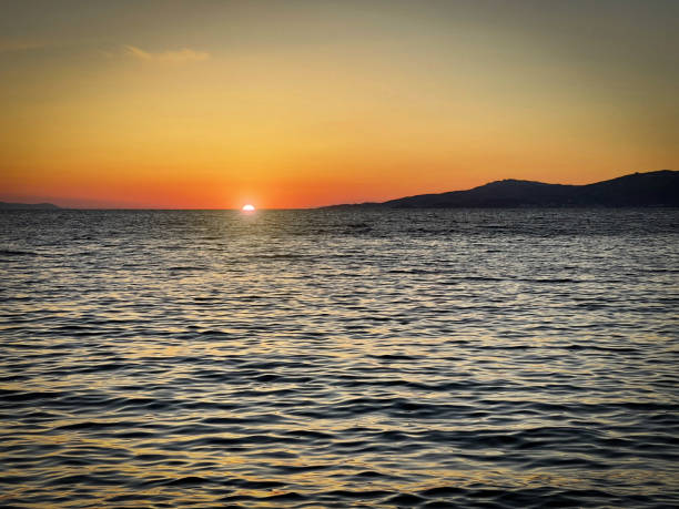 Sunset view from Mykonos town (Chora), Mykonos island, Cyclades, Greece.