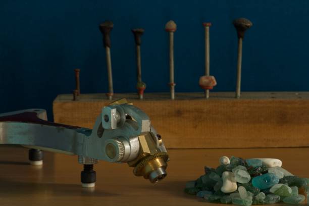 istock Gem faceter, natural rough stones and dop sticks 1369715391