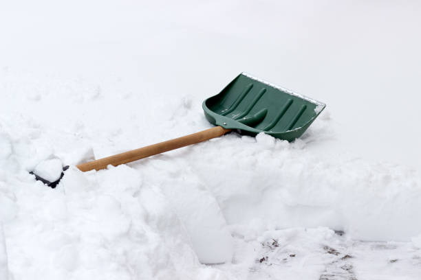 istock snow shovel in the snow 1369716728