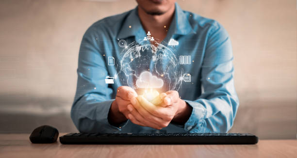istock businessman holding Global network connection 1369720053