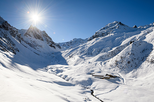 Winter landscape with snow capped mountains. Vorarlberg, Montafon