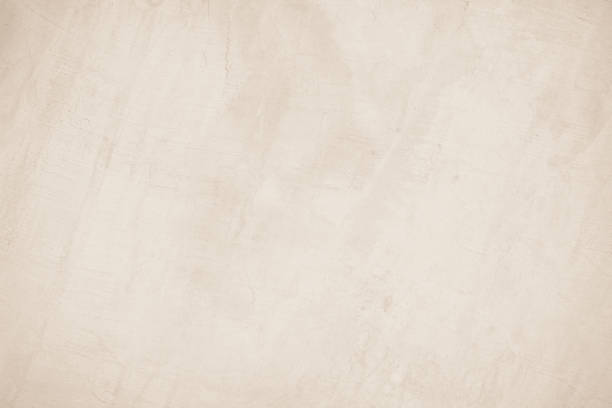istock Cream concrete wall texture background for interiors or outdoor exposed surface polished distress. Cement have sand and stone of tone vintage, natural patterns old antique, design art work floor. 1369720968